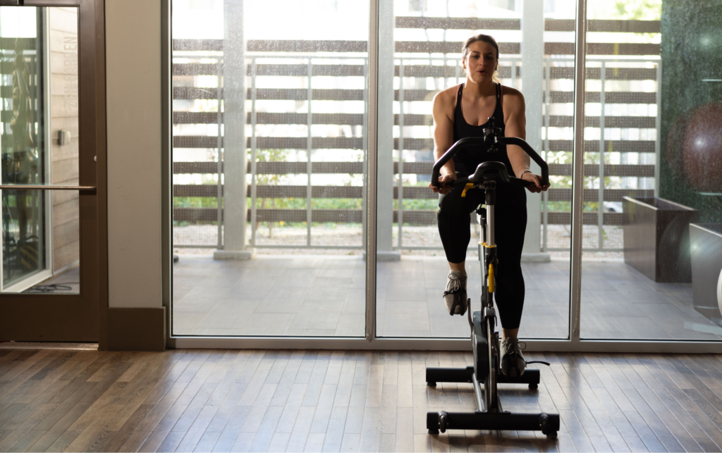 Young Woman on a Stationary Bike