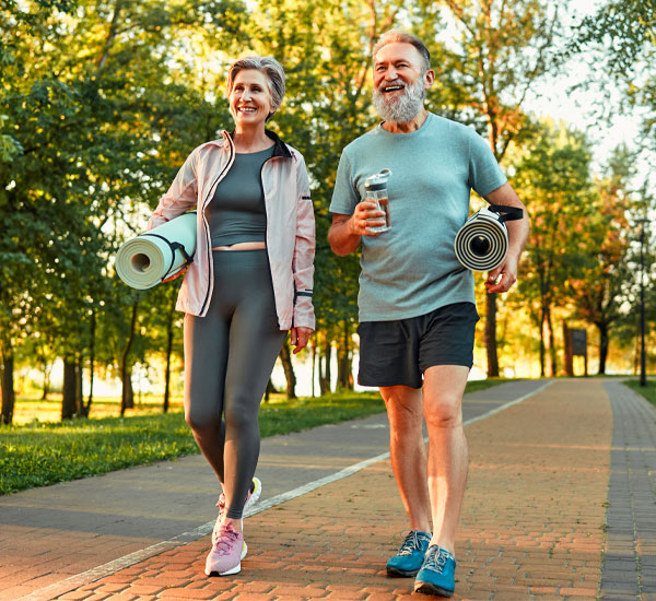 Elderly couple walking